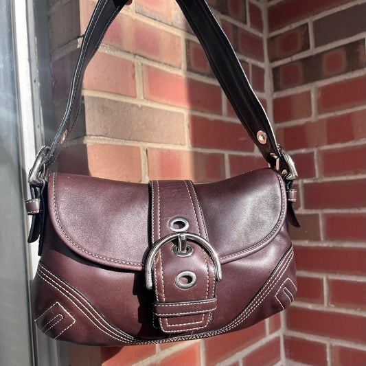 coach soho small leather buckle flap shoulder bag