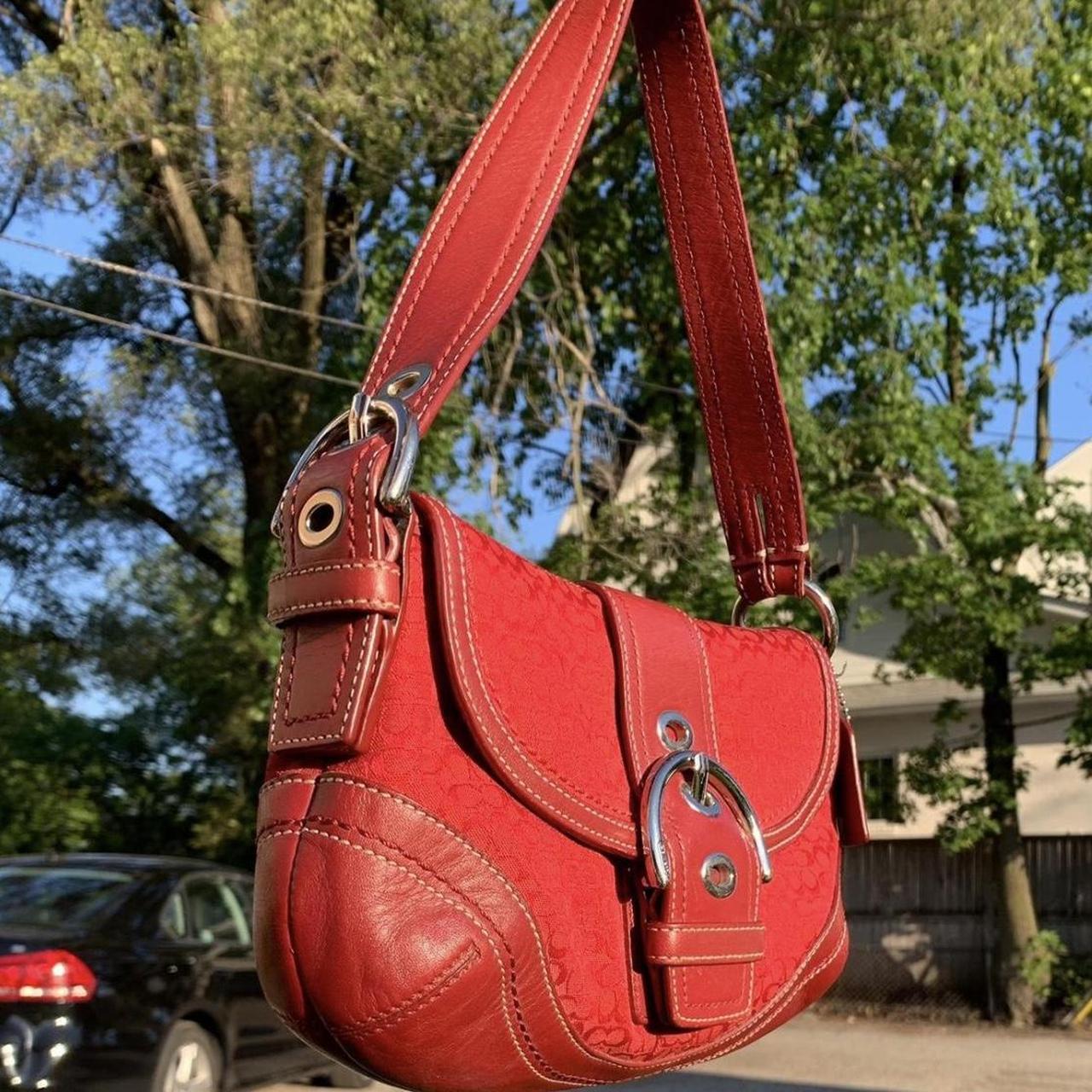 coach soho monogram leather buckle flap shoulder bag